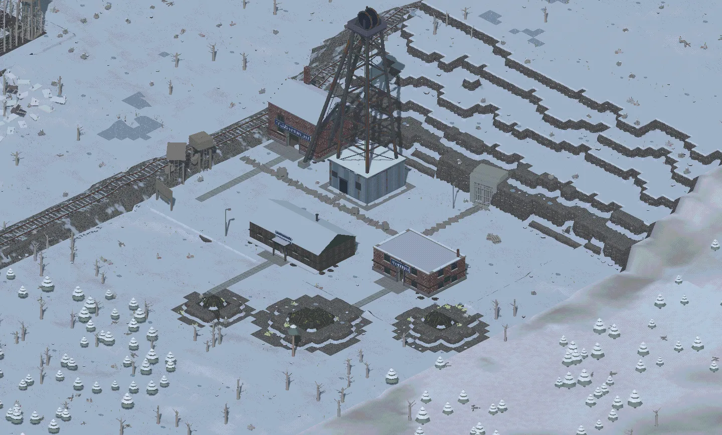 The mine a day beyond the town: a headframe over the shaft, rail sidings, spoil heaps in the snow